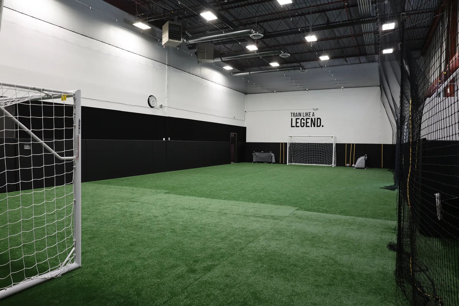 The full-size indoor turf at Legends Training Factory.